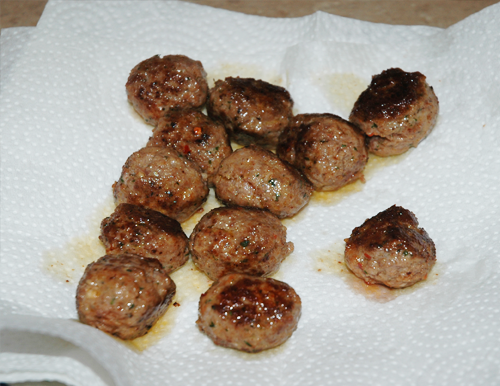 dredge cooked meatballs in flour