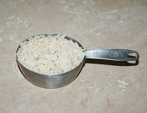 100 grams of cooked rice to cups